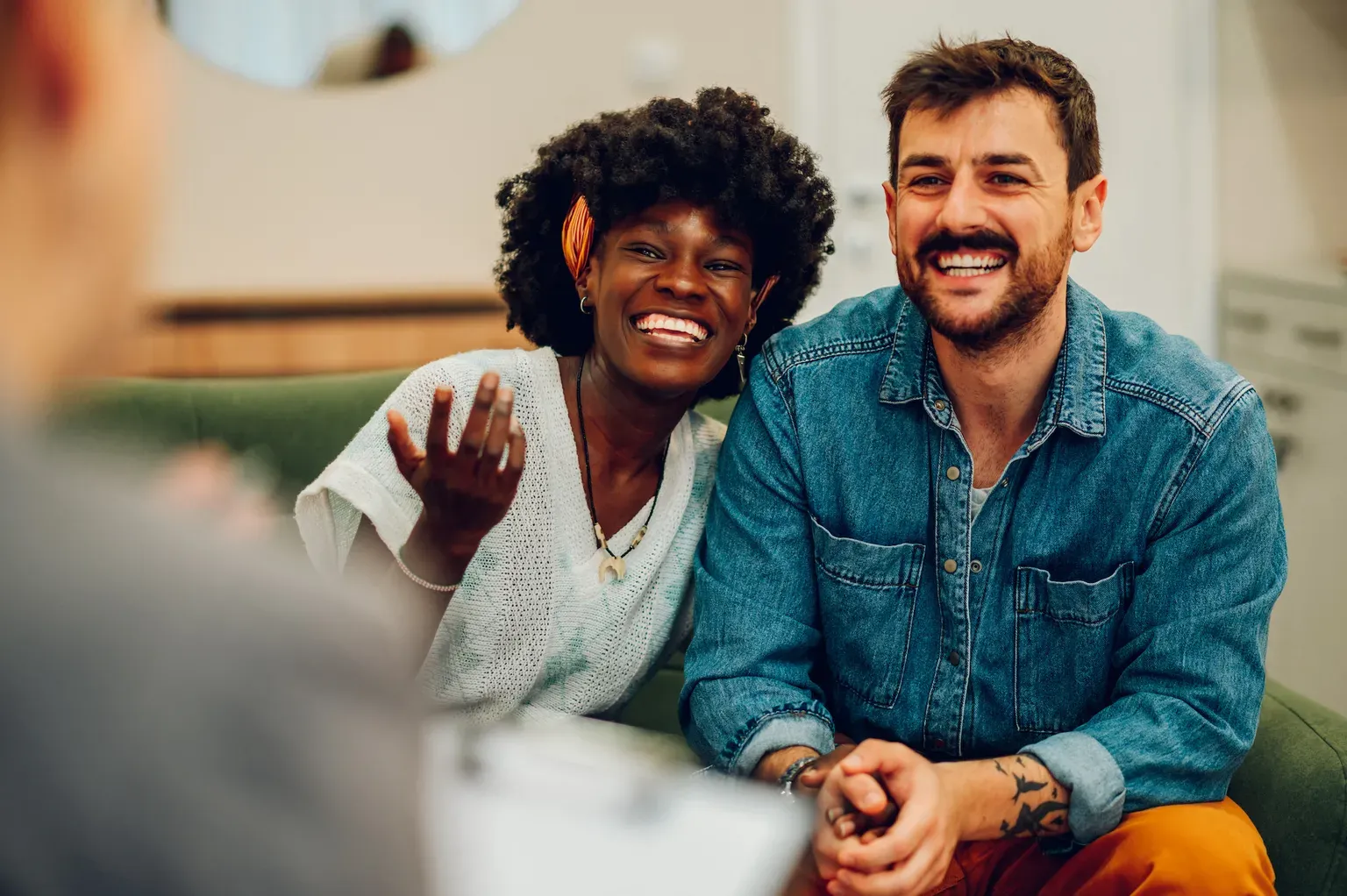 Diverse couple on a therapy session in a psychologist office